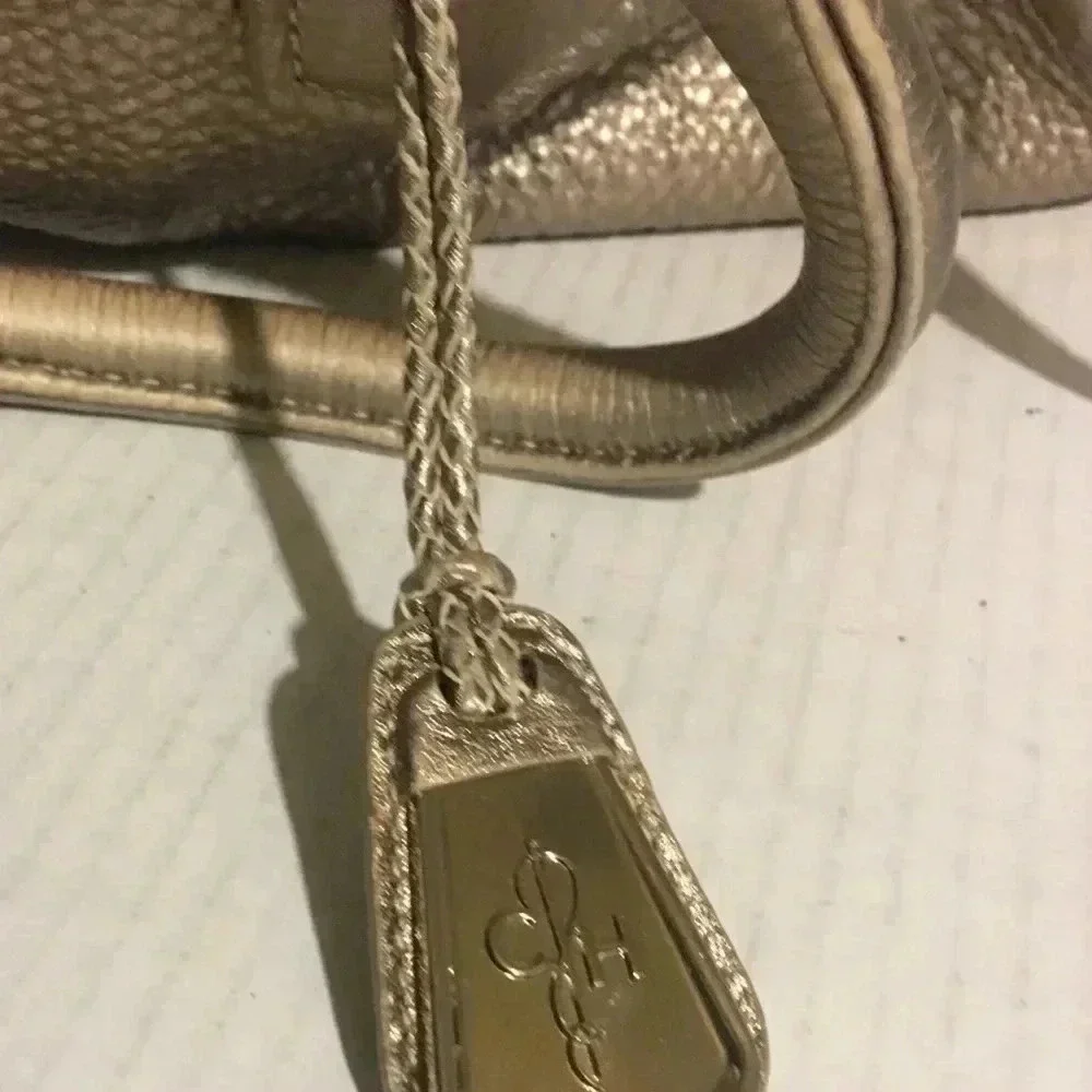 Cole Haan metallic gold leather crossbody handbag
